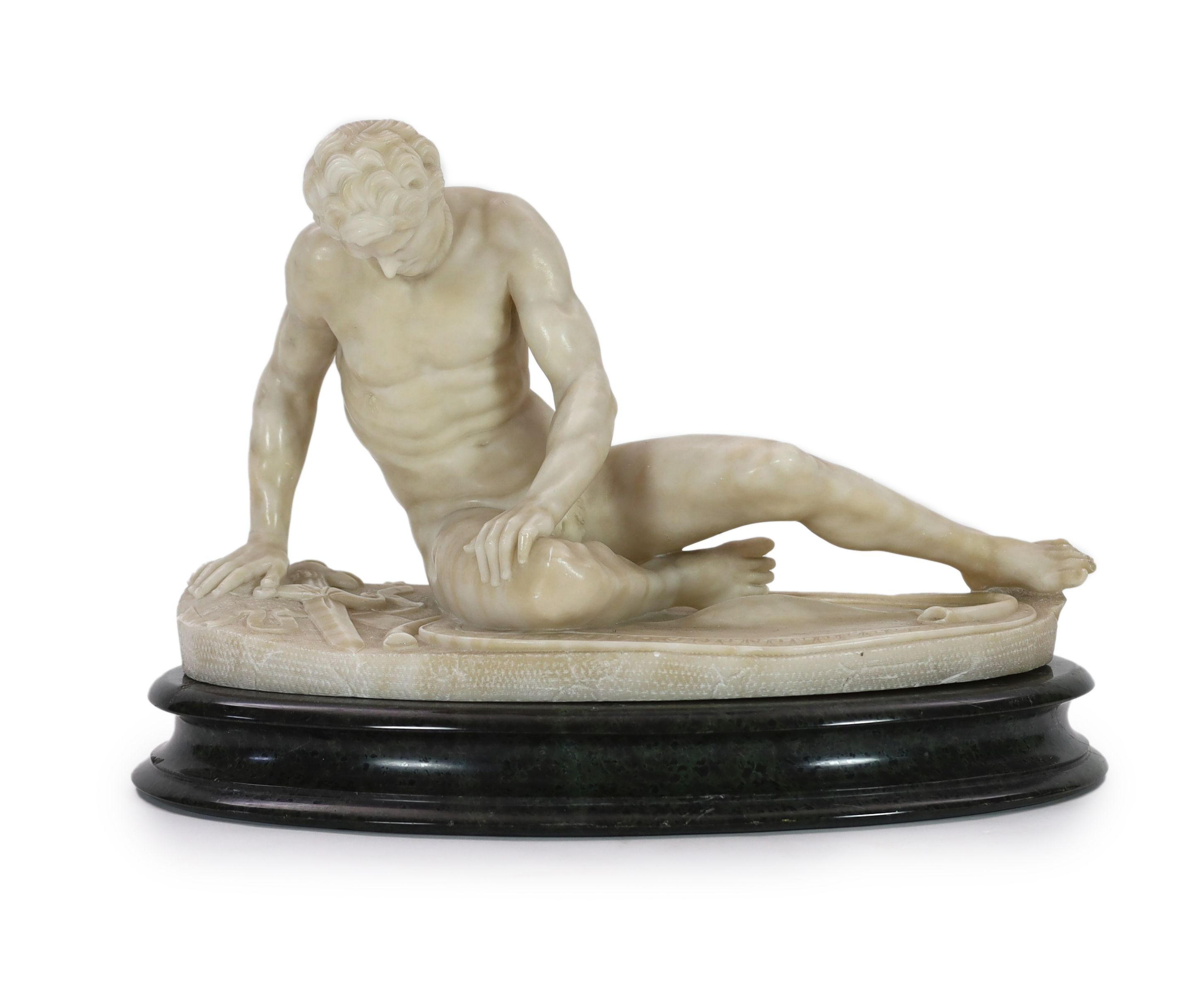 A late 19th century carved alabaster model of The Dying Gaul, width 65cm, height 43cm